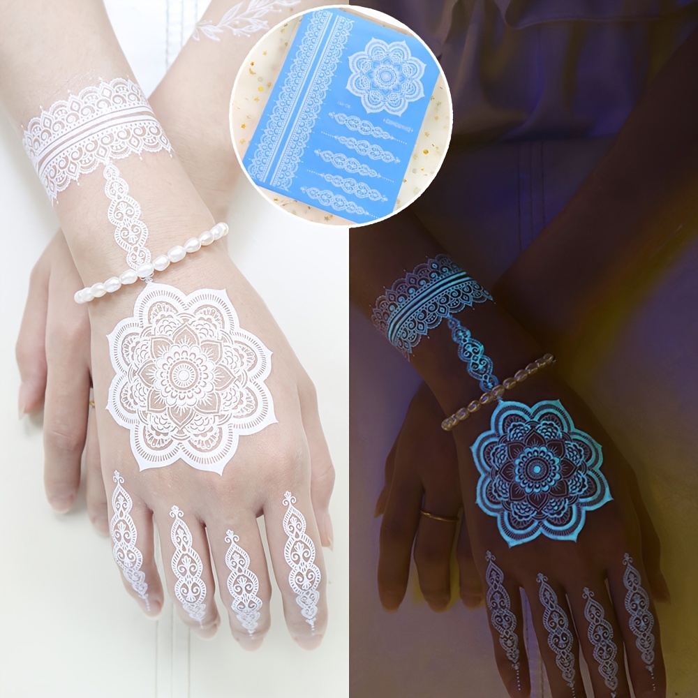 Blauwe lichtgevende henna tatt - Body Jewelry Glue recensie en prijs